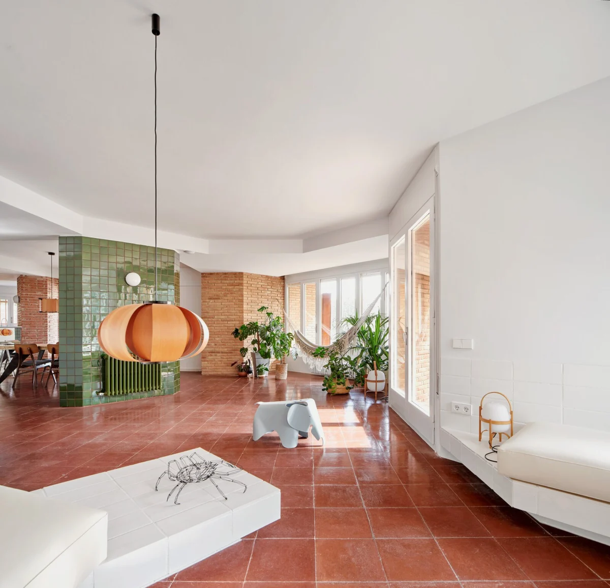 A 1970s Barcelona Home Reimagined as a "Tangram House" by Twobo Arquitectura, Embracing Doorless, Flexible Living