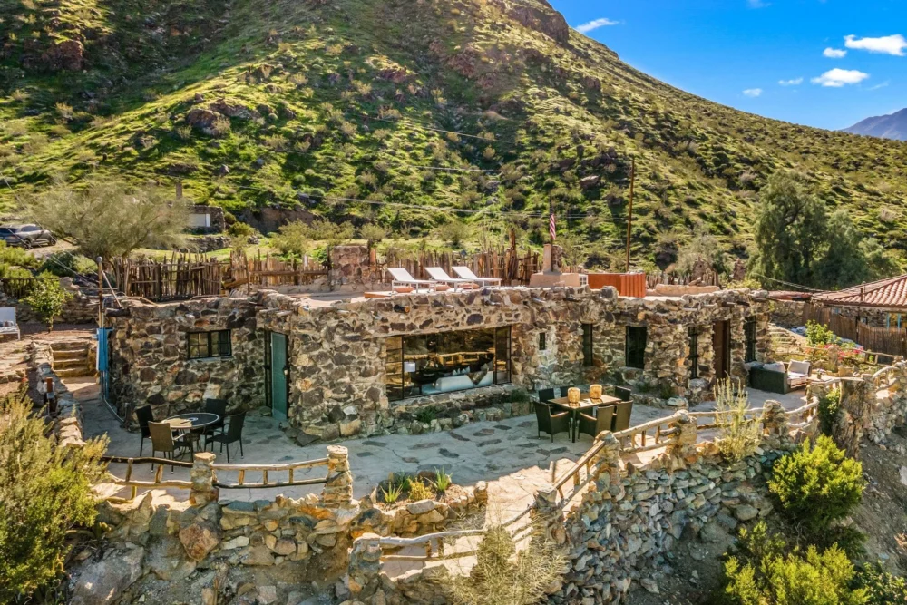 An Iconic Palm Springs Rock House, a Class One Historic Landmark, is Listed for $1.5 Million, Offering a Unique Blend of History and Modern Luxury