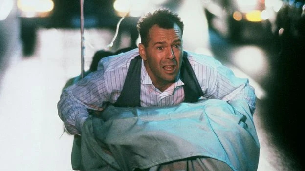 From Bartender’s Ambition to Hollywood’s Most Notorious Production: The Complex Legacy of Hudson Hawk Thirty-Five Years Later