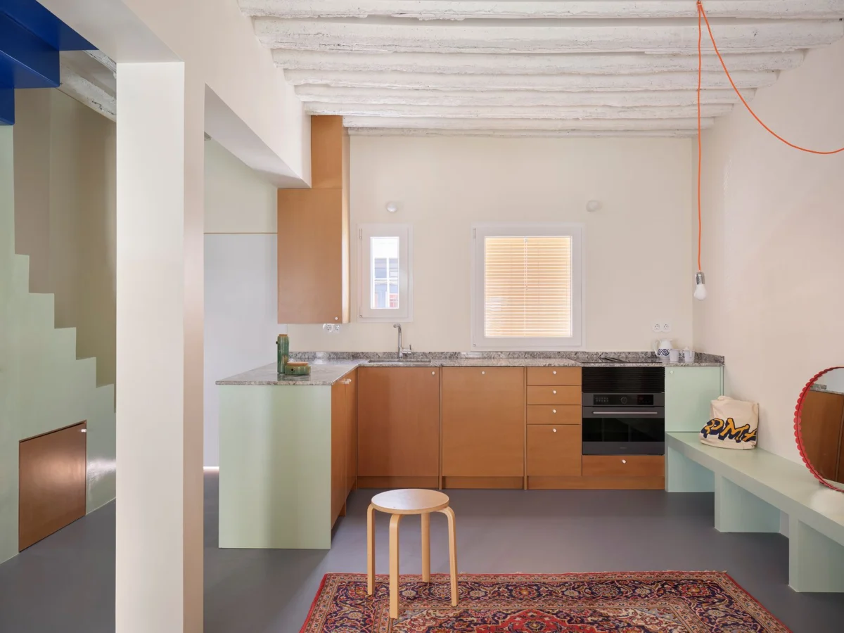 Transformative Renovation Reinvents 1940s Madrid Townhome into a Dynamic, Open-Plan Oasis.