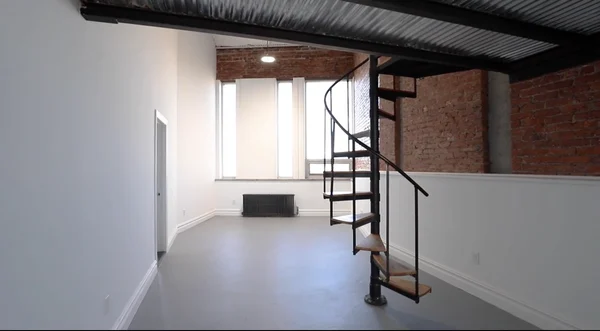 Mariano Testa’s Firehouse Loft Transforms a Heavy Metal Door into a Dynamic Chronicle of Life’s Moments