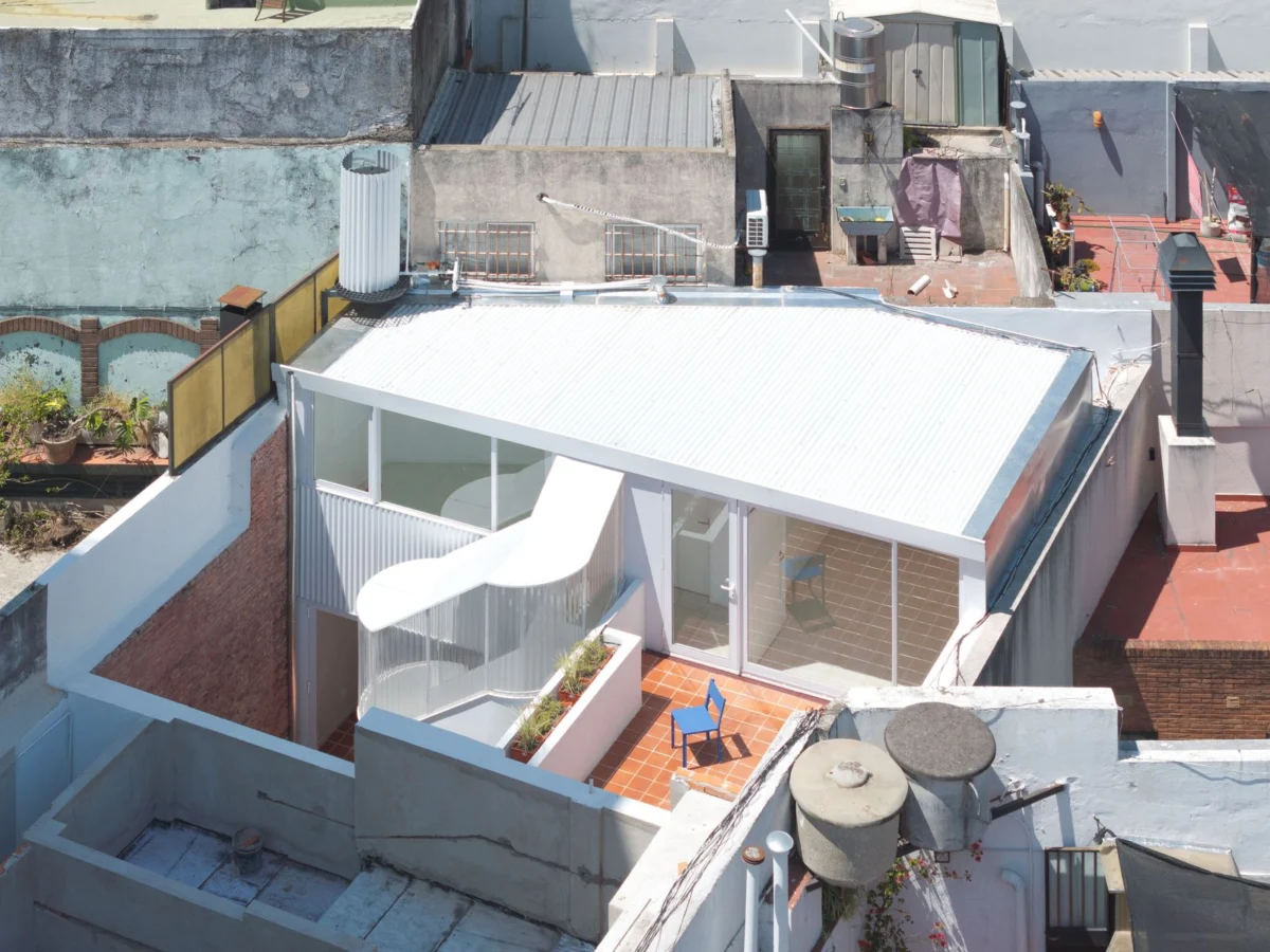 A Translucent Exterior Stair Reorganizes This 1950s ‘Propiedad Horizontal’ in Buenos Aires