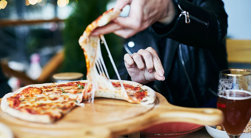 Take a cue from the 2026 World’s Best Cheese Slice winner.