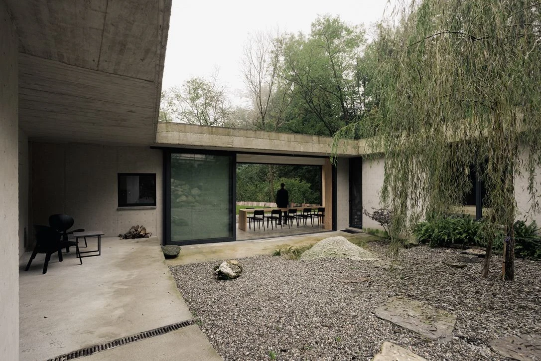Near Lake Como, This €690K Concrete House Makes the Most of Its Narrow Site